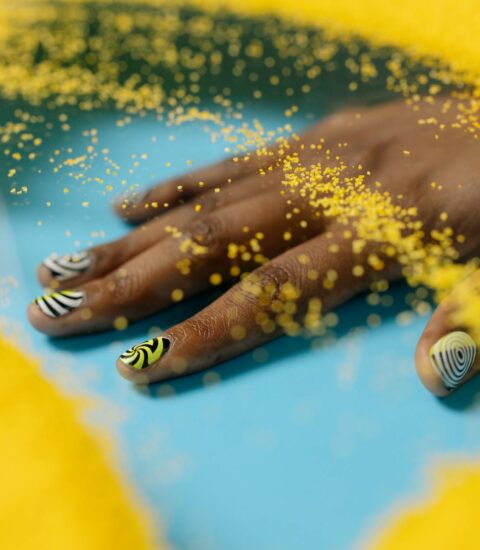 close up shot of a hand with nail polish